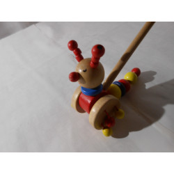 Clown sur roue en bois