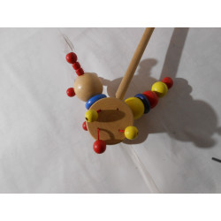 Clown sur roue en bois