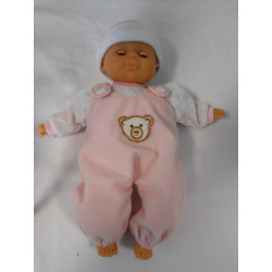 Poupée dans sa balancelle